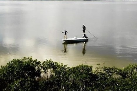 a small boat in a body of water