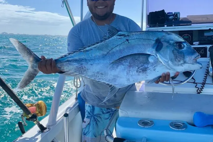 a man sitting on a boat