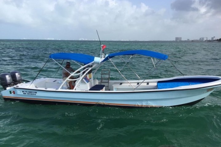 a small boat in a body of water