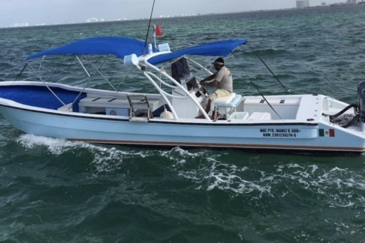 a small boat in a body of water