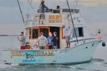 a small boat in a large body of water