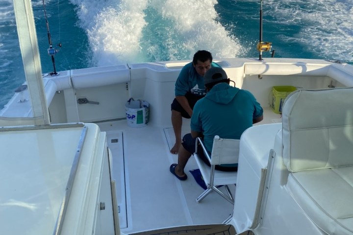 a man on a boat in the water