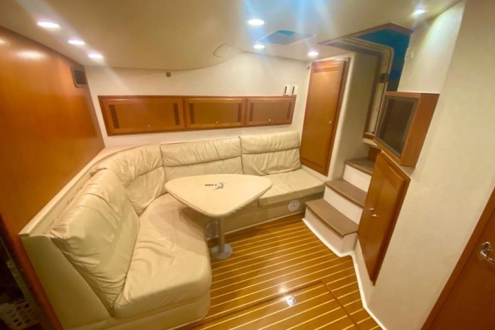 a bedroom with a bed and a mirror