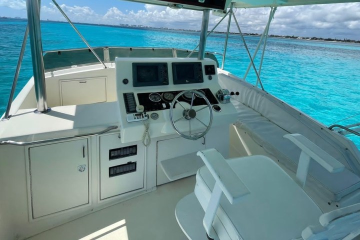 a boat sitting next to a body of water