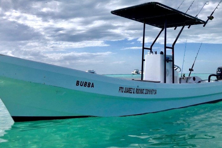 a small boat in a large body of water