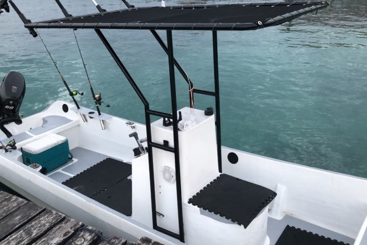 a small boat in a body of water