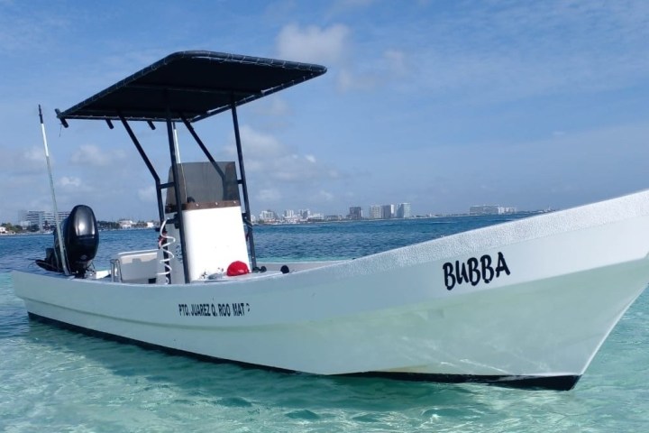 a small boat in a large body of water