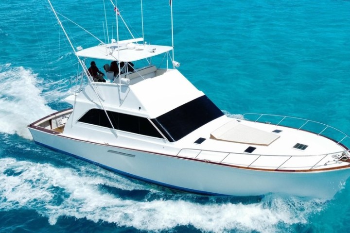 a small boat in a large body of water