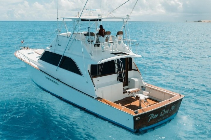 a small boat in a large body of water