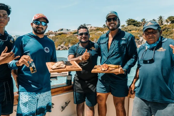 a group of people posing for the camera
