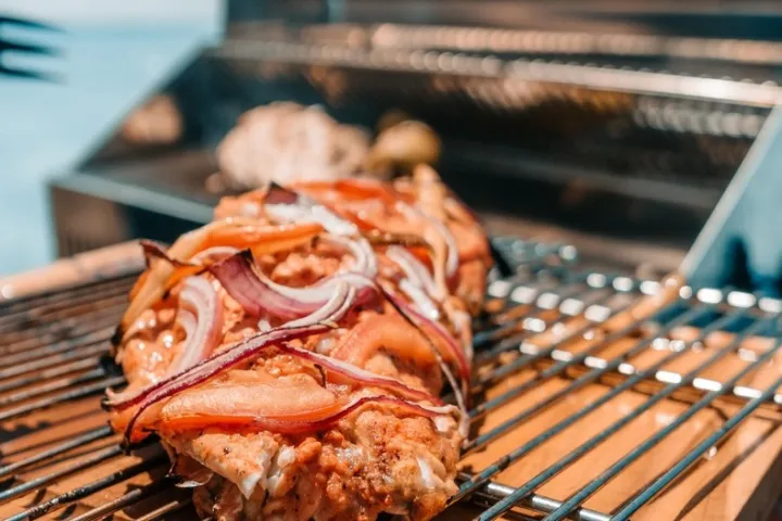 a close up of food on a grill