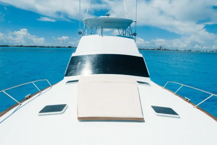 a small boat in a large body of water