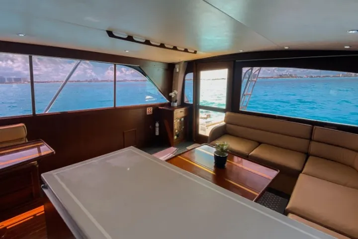 an island in the middle of a table next to a window