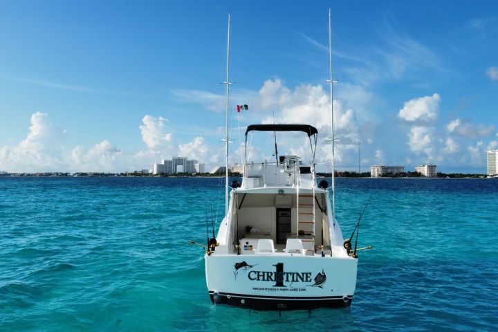 a small boat in a body of water