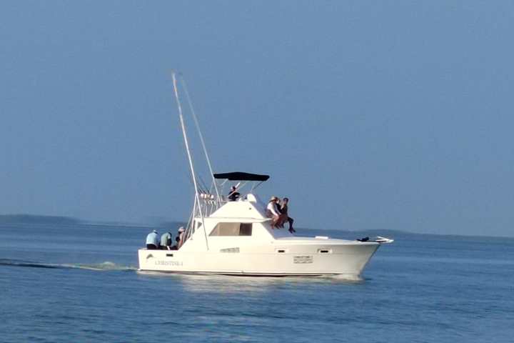 a small boat in a body of water