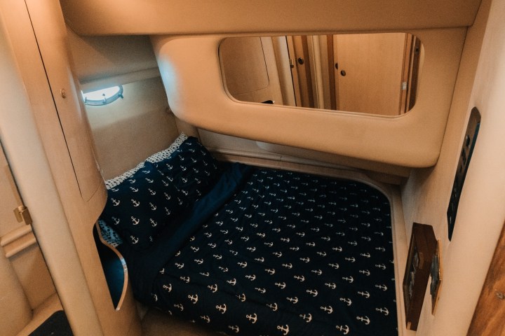 a laptop computer sitting on top of a chair