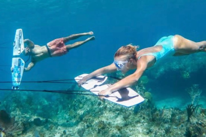 a person swimming in a pool of water