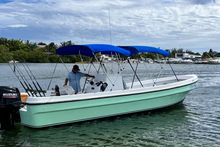 a small boat in a body of water